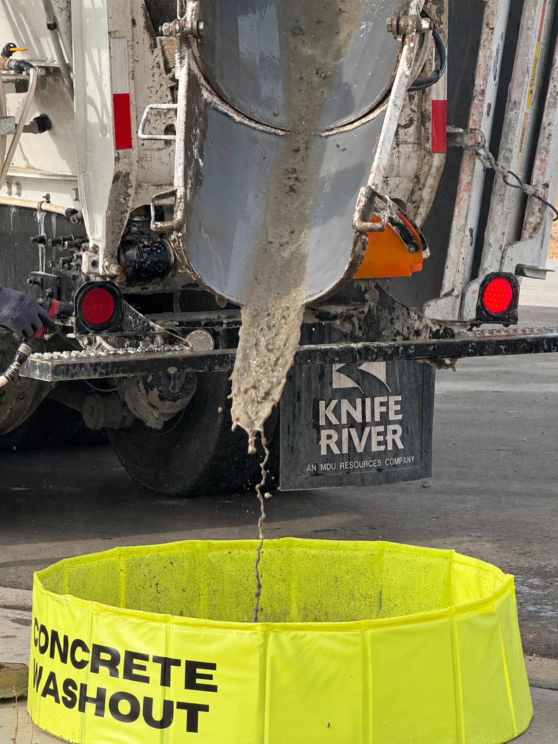 Knife River washout operation — concrete discharge close-up